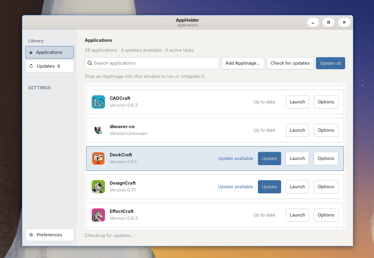 AppHolder library showing installed AppImages, update status, and launch and options actions